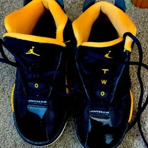 BlCk and yellow Jordan’s